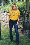 Model wearing our Have a Golden Day tee for a very retro style.